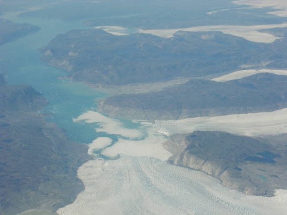 Western coast of Greenland, and more tongues of glaciers meeting the ocean.